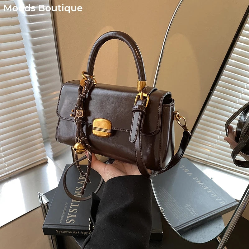 Bolsa Viena – Elegância Clássica em Versão Compacta